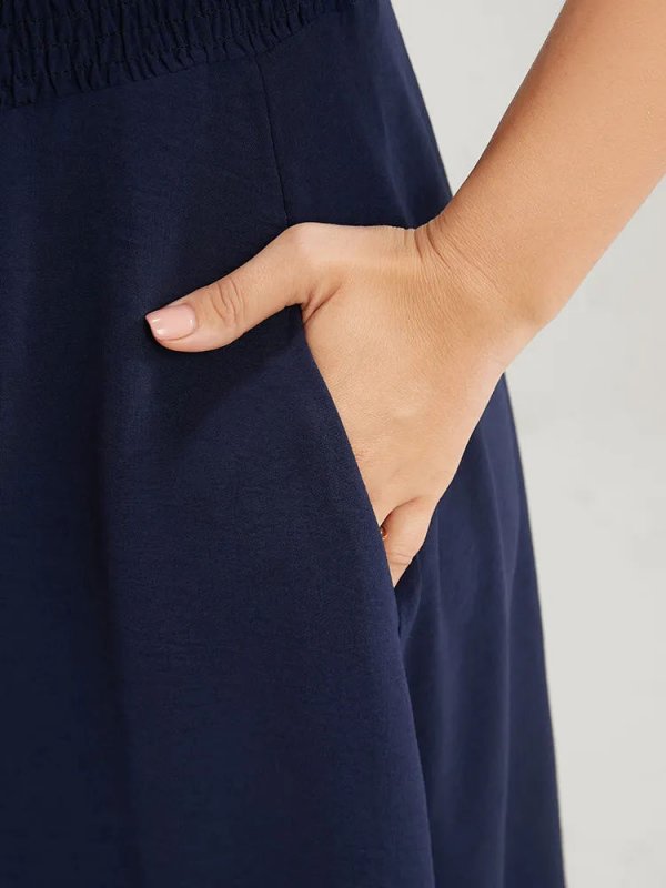 Solid Laser Cut Shirred Pocket Wrap Scalloped Trim Flutter Dress